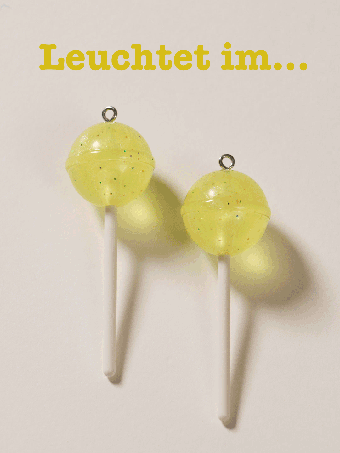 J&amp;J Lollipop glow in the dark gelb