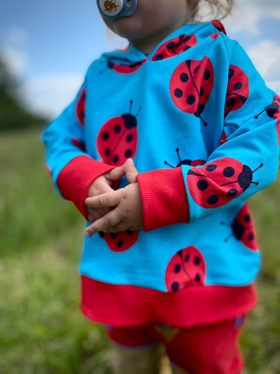 J&amp;J French Terry big Ladybug helltürkis