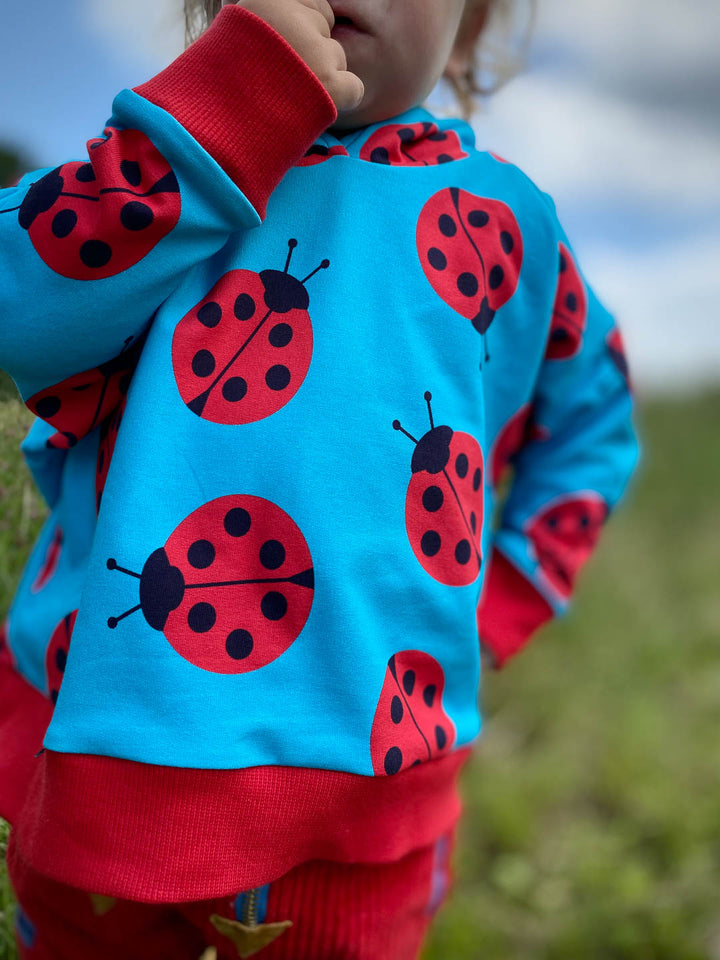 J&amp;J French Terry big Ladybug helltürkis