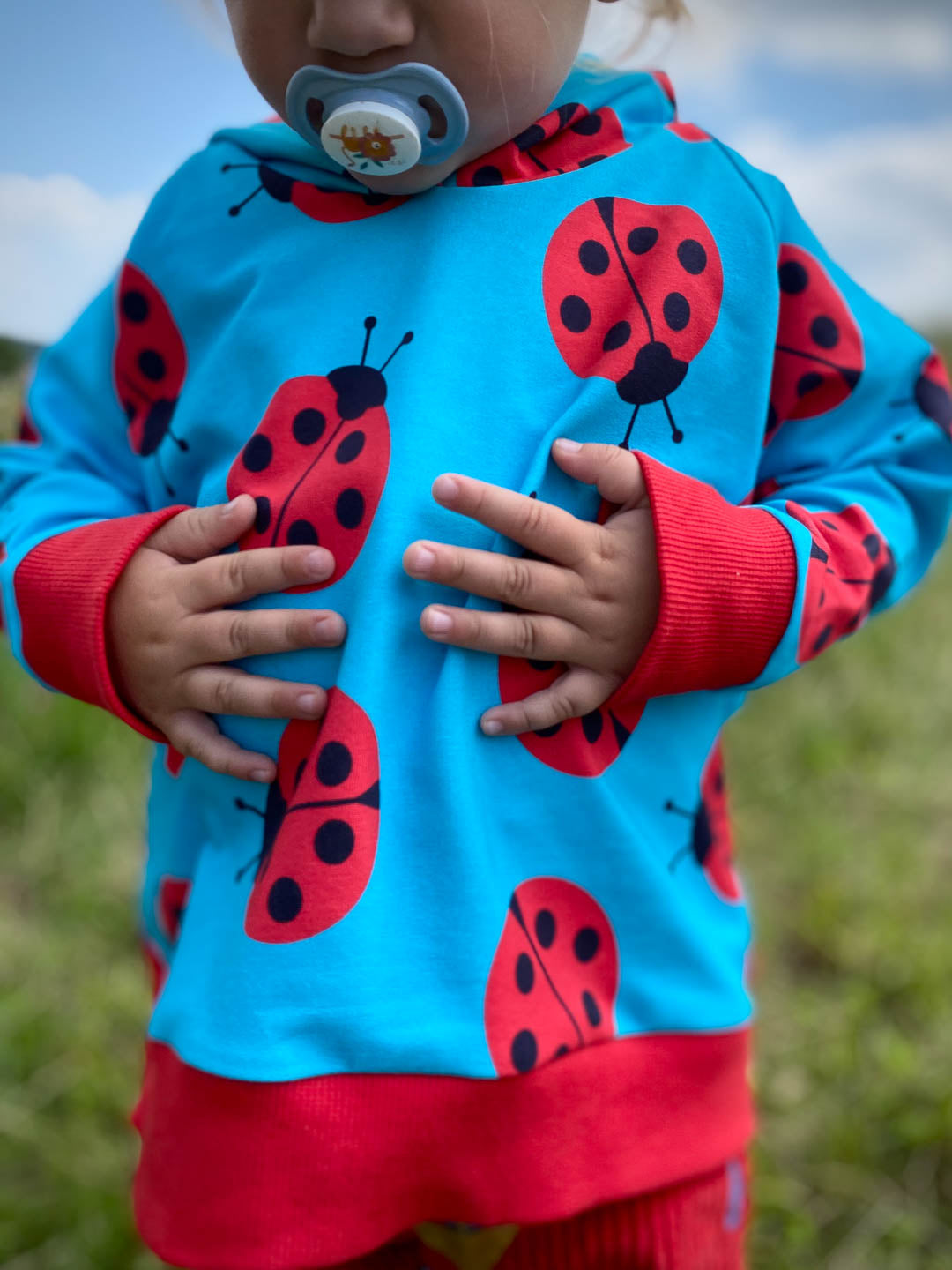 J&amp;J French Terry big Ladybug helltürkis