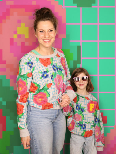 French Terry Sally go round the roses melange extrabreit