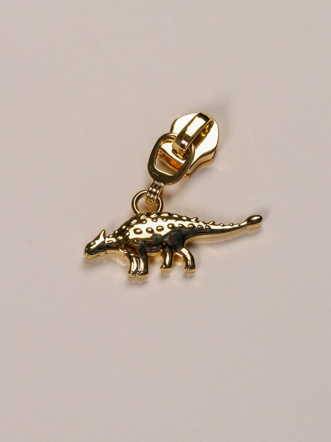 J&J Zipper Mighty Dinosaurs gold