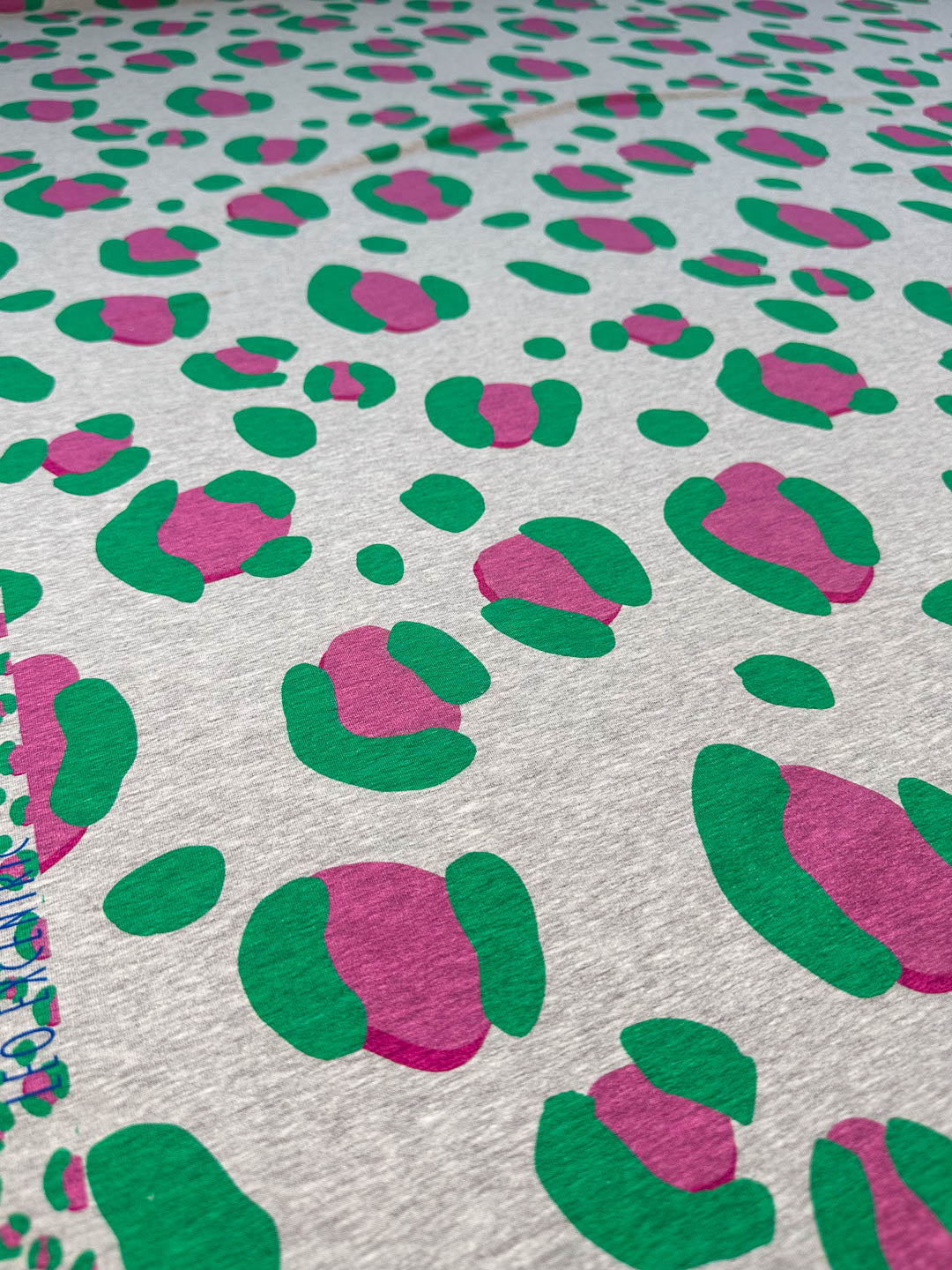 French Terry Leo Excentric melange  grün extrabreit